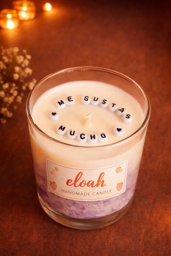 Vela aromática en vaso con la frase Me gustas mucho